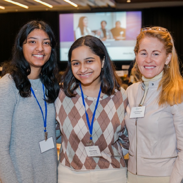 Three women smiling